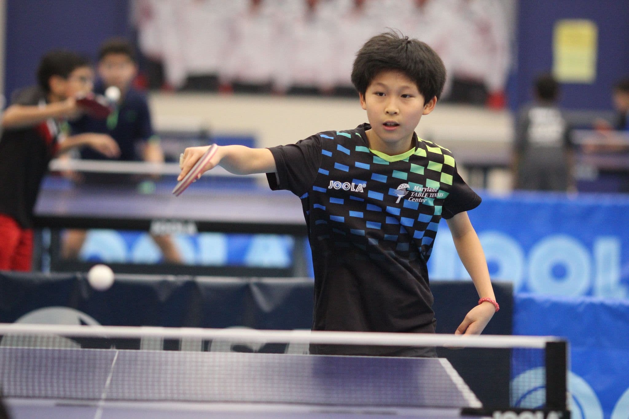 Junior player competing at an MDTTC tournament